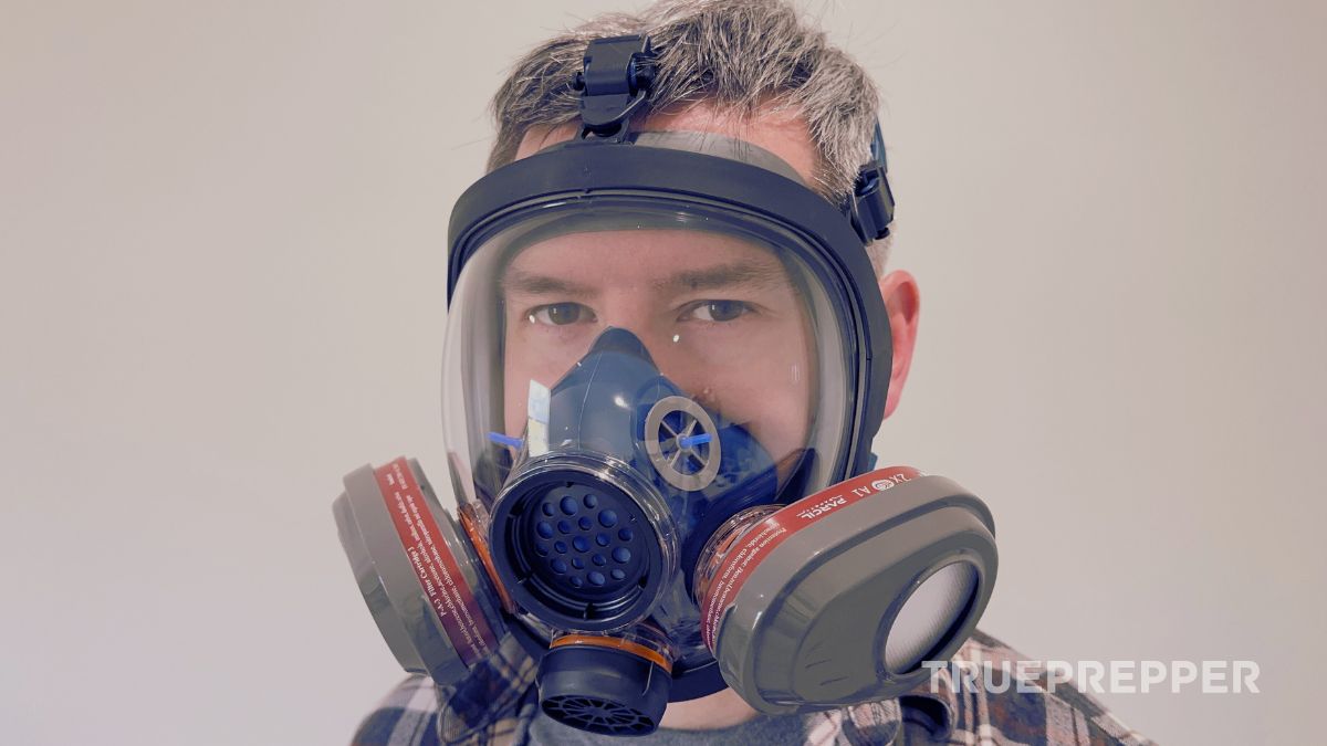 Close up of a man, Sean, wearing a Parcil PD-101 gas mask.