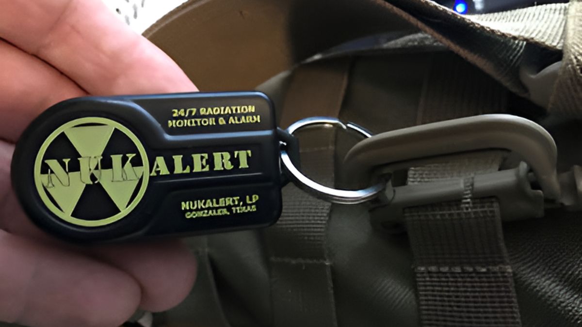 NUKAlert on my EDC bag, held by a keychain Grimlock MOLLE attachment.